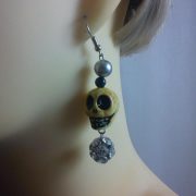 3D skull and crystal dangle earrings