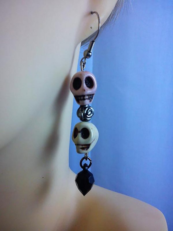 Double skull and bead earrings