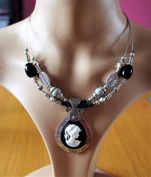 Black and white teardrop lady cameo and silver and black nouveau bead necklace