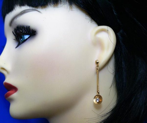 Gold medallion and jewel drop lever earrings