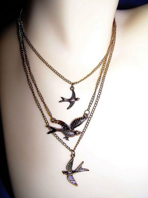 Gold multi swallow necklace