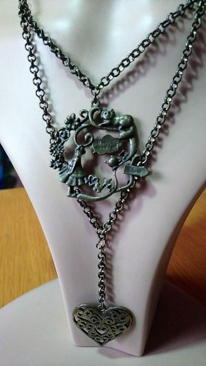 Antique Gold Alice in Wonderland silhouette cameo and drop charm necklace