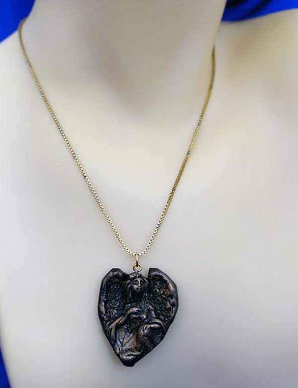 Black and gold 3D angel cameo necklace