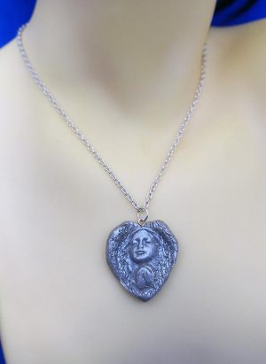 Silver heart angel cameo necklace