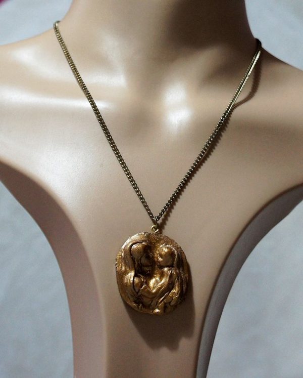 Mary and baby Jesus gold cameo necklace