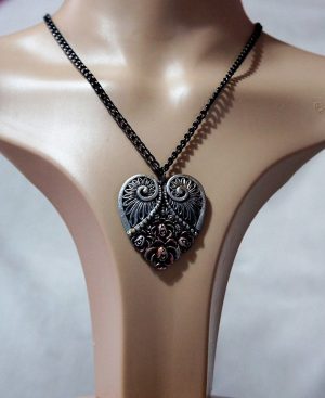 Rose and swirl 3D heart Steampunk style necklace,  great engraved detail and a mixed genre, black handmade resin with hand painting with silver and red highlighted detail heart set on a black and silver size 60cm chain necklace.