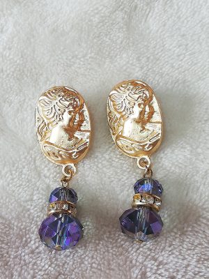 Gold cameo lady and purple crystal jewel earrings